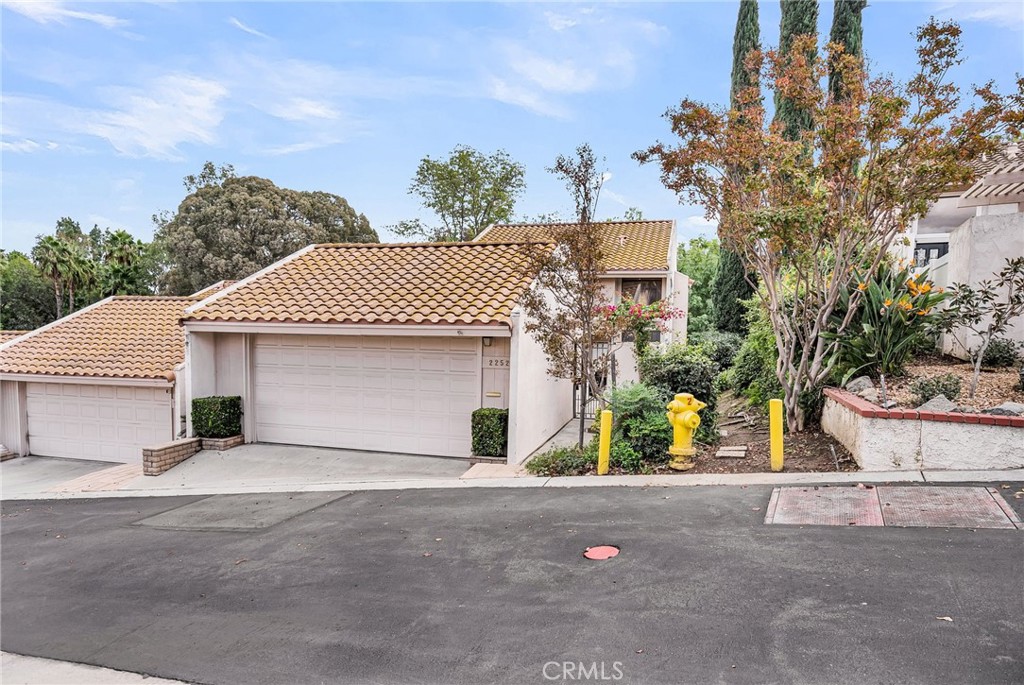 2252 El Capitan Drive Riverside, CA 92506 - Photo 3 of 51 front view of a house with a street