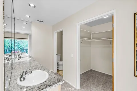 a view of balcony with wooden floor