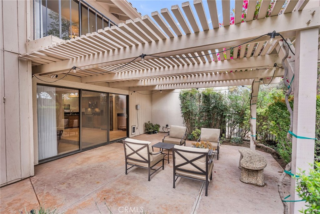 2252 El Capitan Drive Riverside, CA 92506 - Photo 39 of 51 a patio with glass top table and chairs