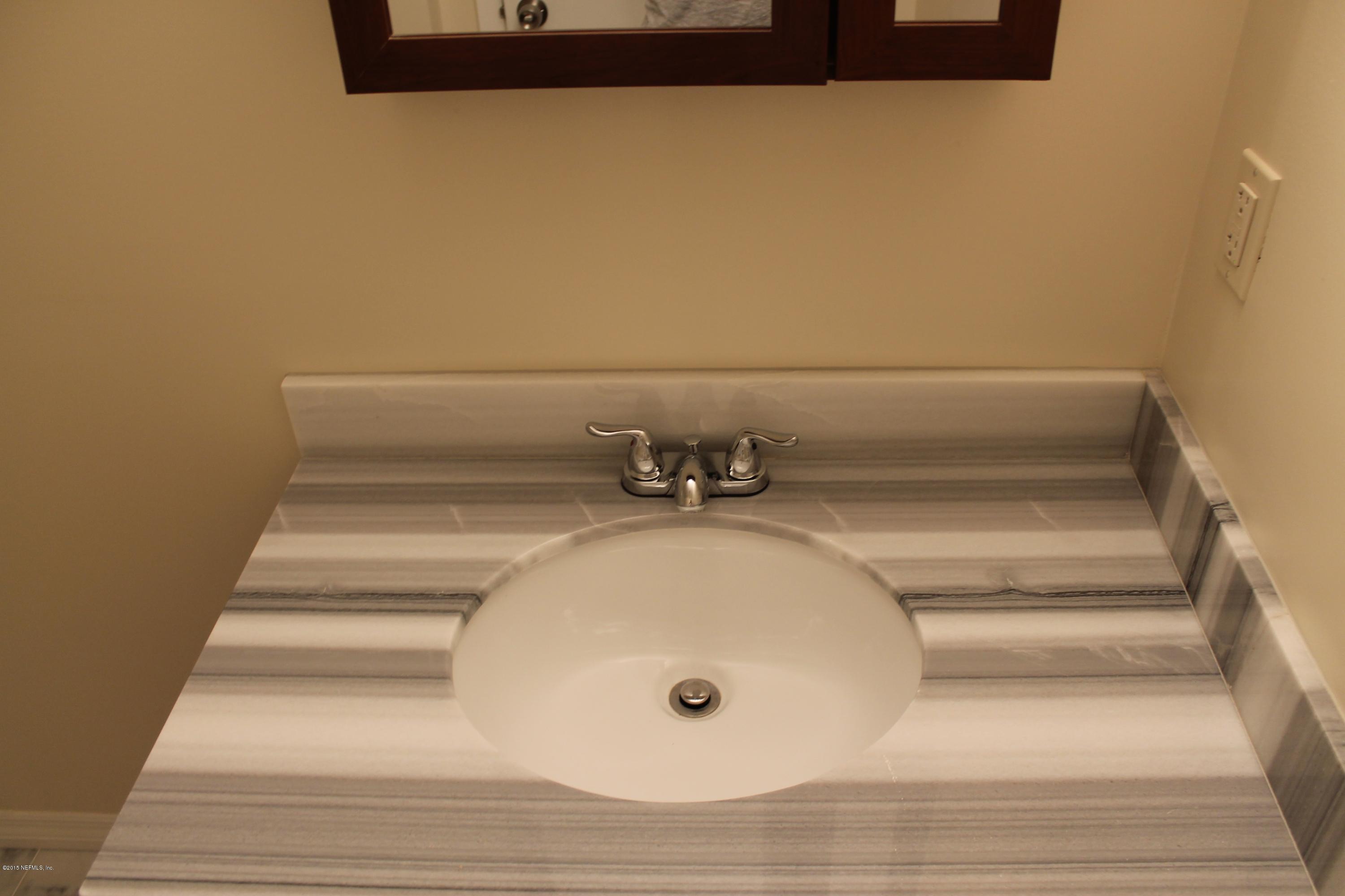 6207 Lone Star Road Jacksonville, FL 32211 - Photo 15 of 35 a bathroom with a bathtub