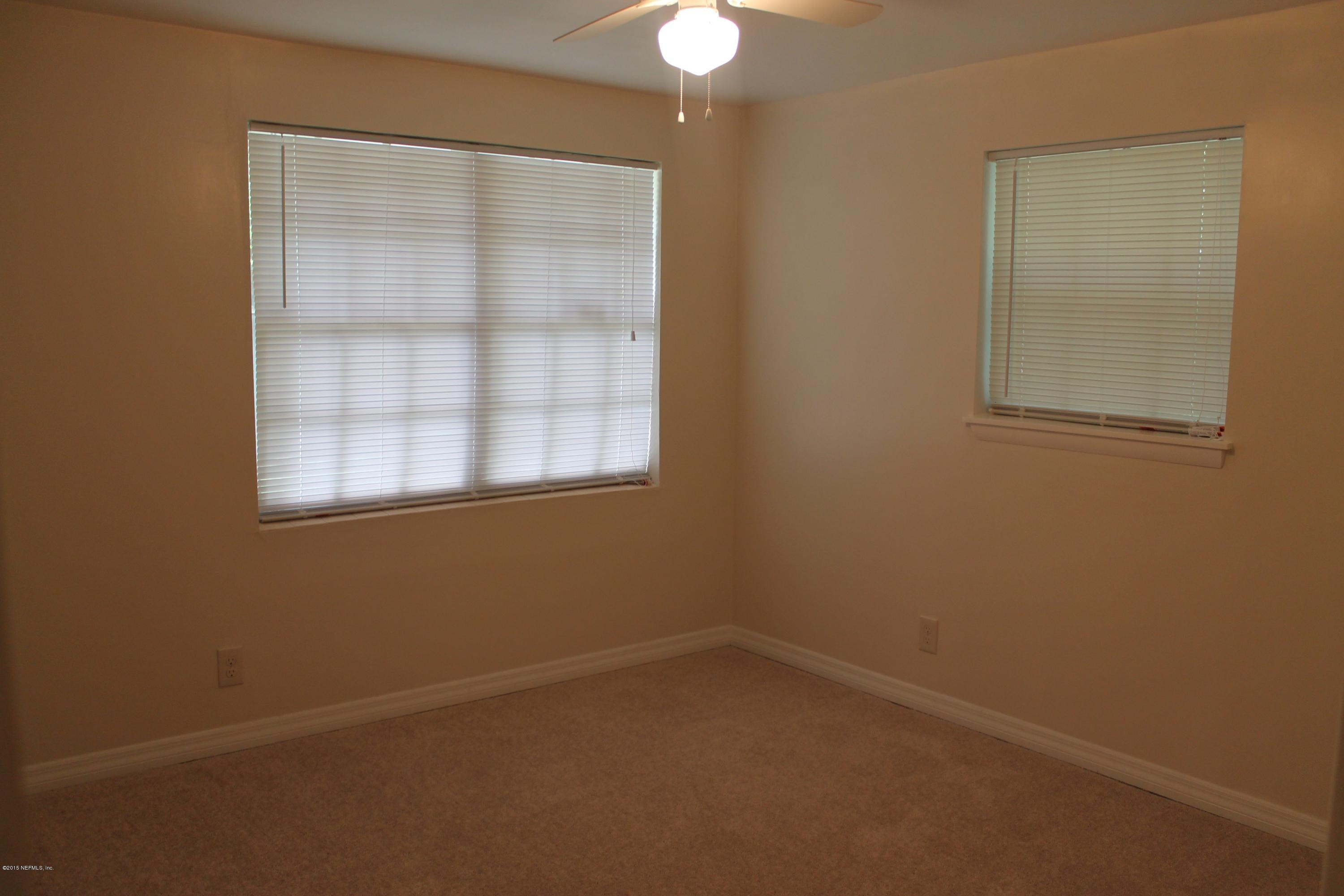 6207 Lone Star Road Jacksonville, FL 32211 - Photo 19 of 35 an empty room with a window