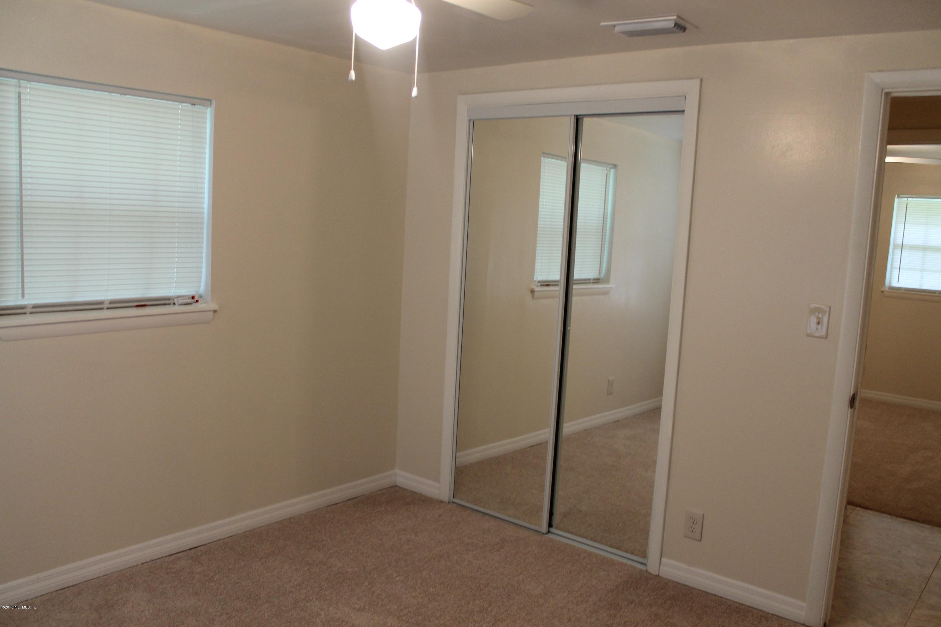 6207 Lone Star Road Jacksonville, FL 32211 - Photo 21 of 35 an empty room with closet