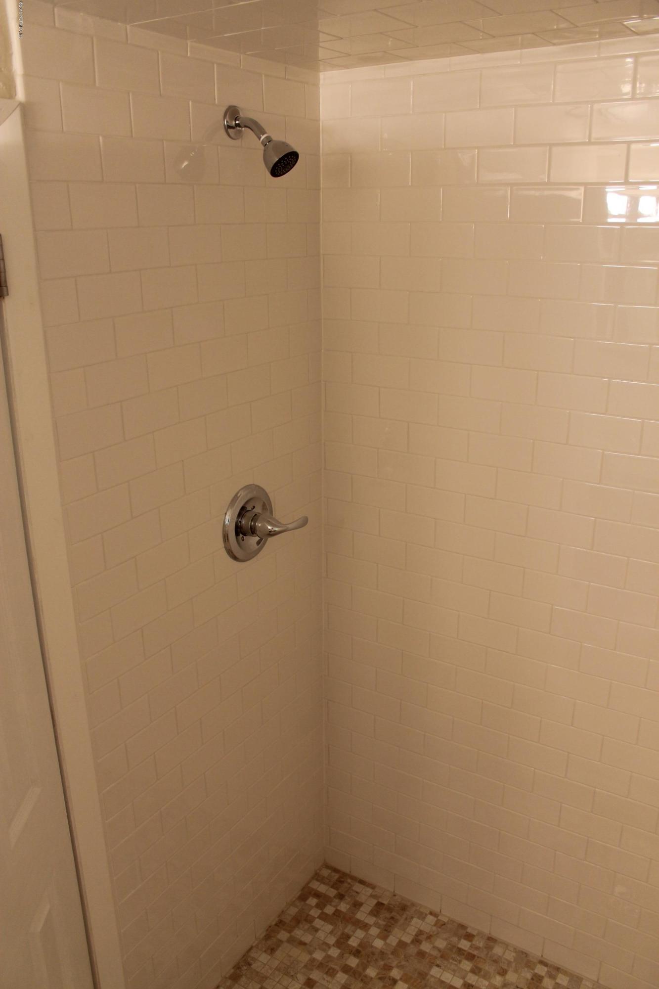 6207 Lone Star Road Jacksonville, FL 32211 - Photo 27 of 35 a bathroom with a shower