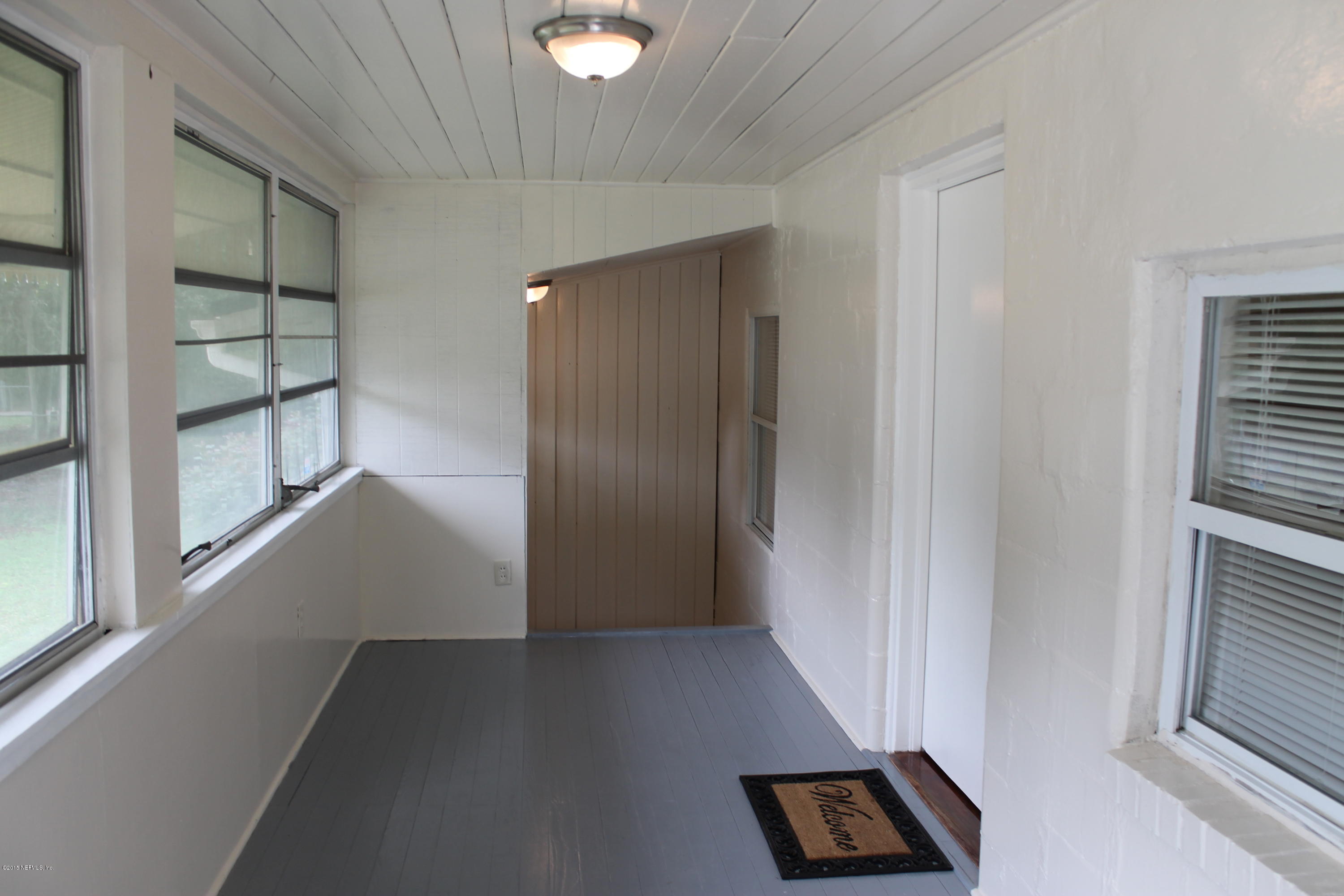 6207 Lone Star Road Jacksonville, FL 32211 - Photo 3 of 35 an entryway with a rug