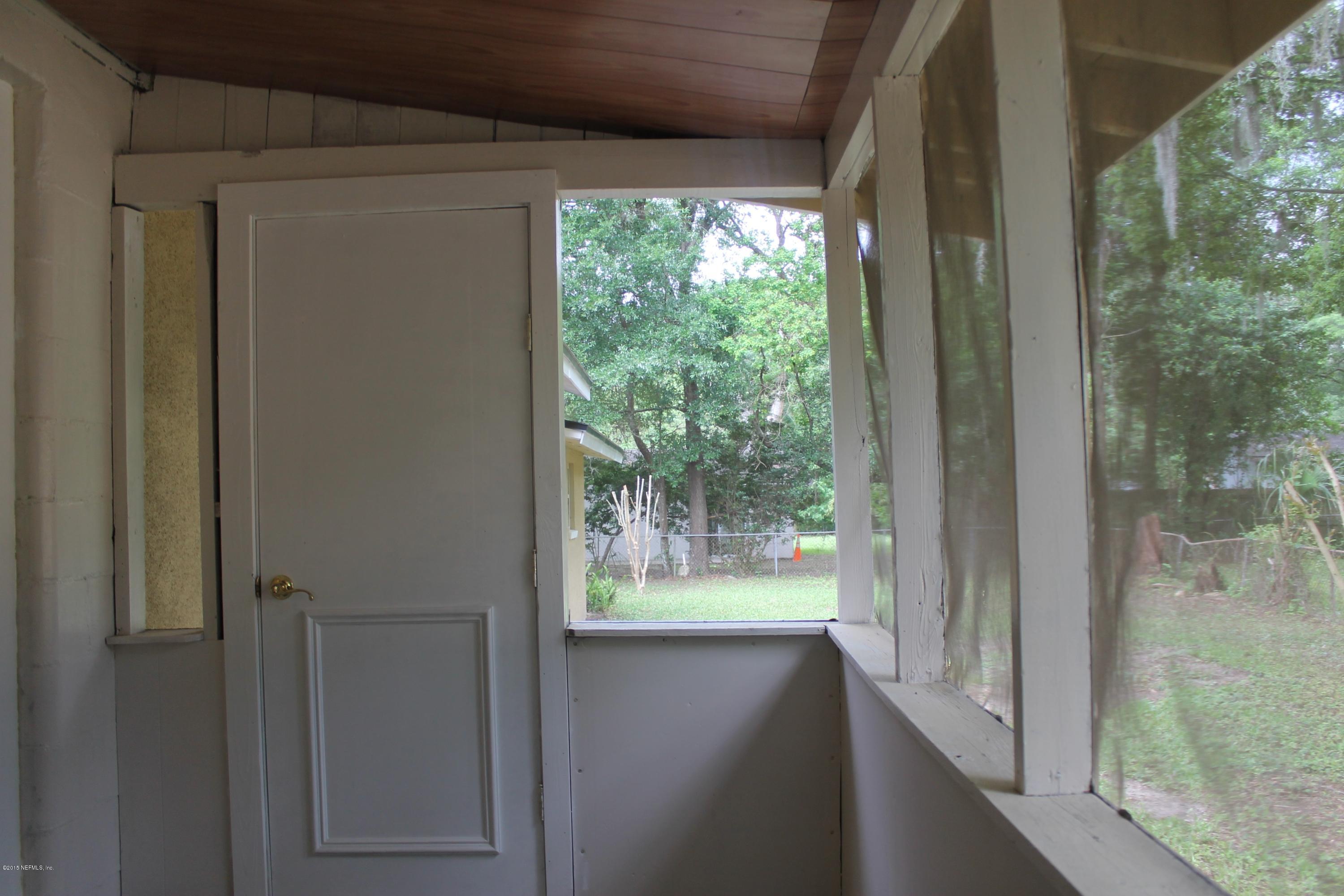 6207 Lone Star Road Jacksonville, FL 32211 - Photo 33 of 35 a view of a glass door with a balcony from a room