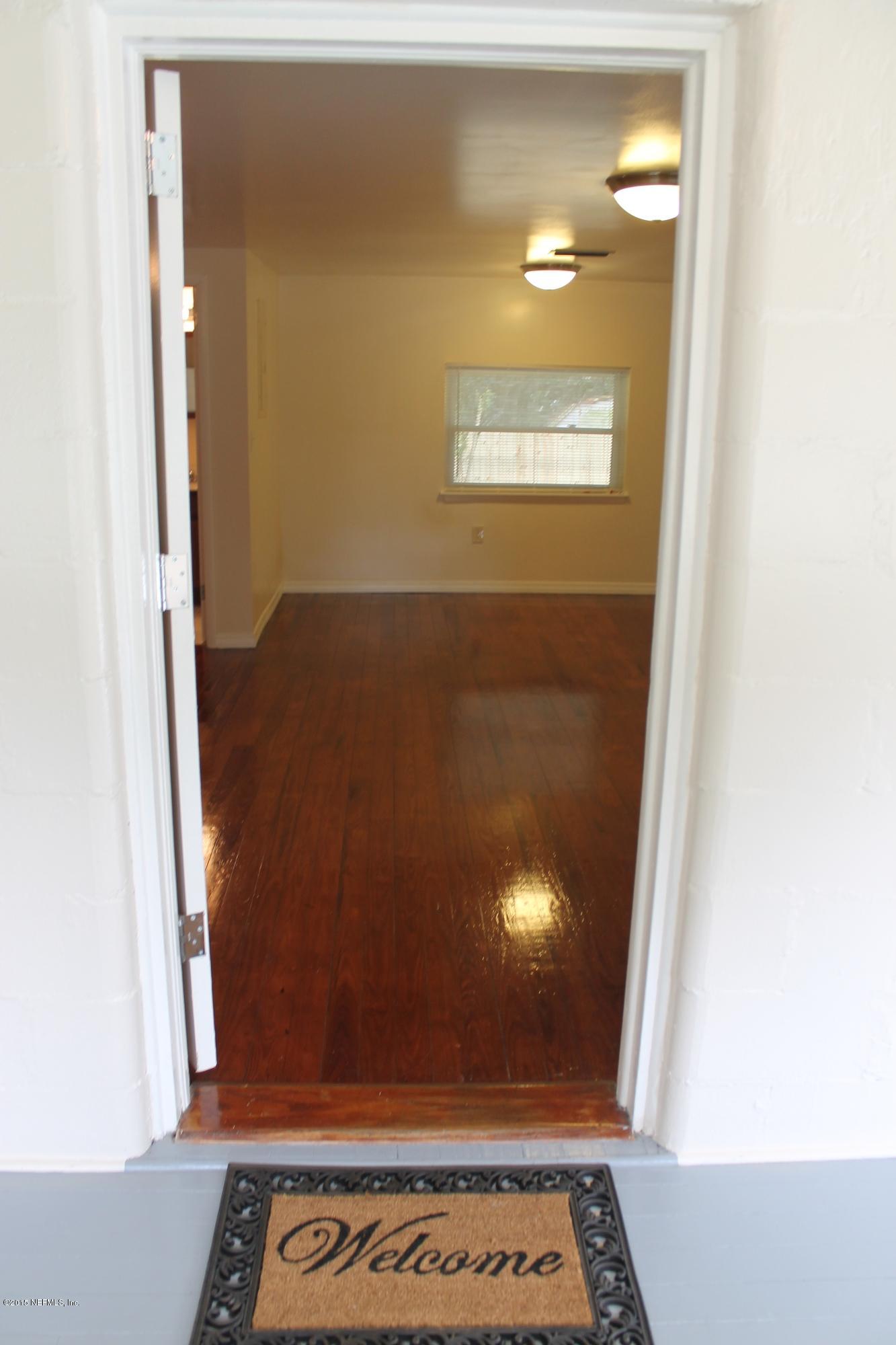 6207 Lone Star Road Jacksonville, FL 32211 - Photo 5 of 35 a view of an empty room with a window