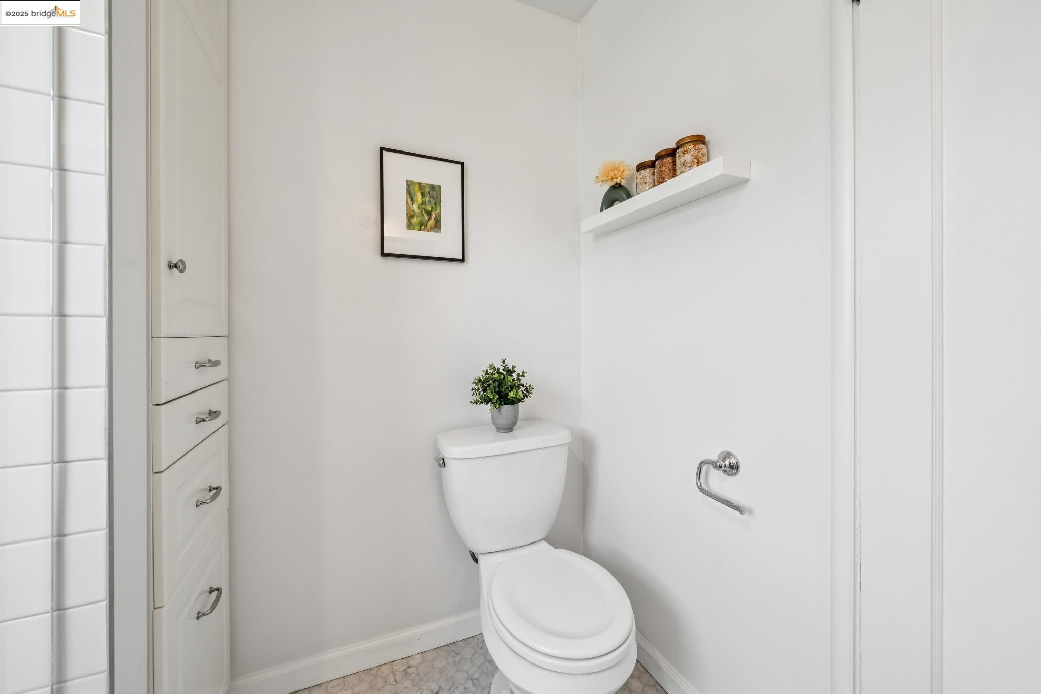 4170 Emerald Street, Unit 4 Oakland, CA 94609 - Photo 13 of 37 Bathroom with baseboards and toilet