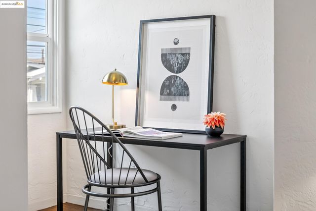 a view of a workspace with furniture