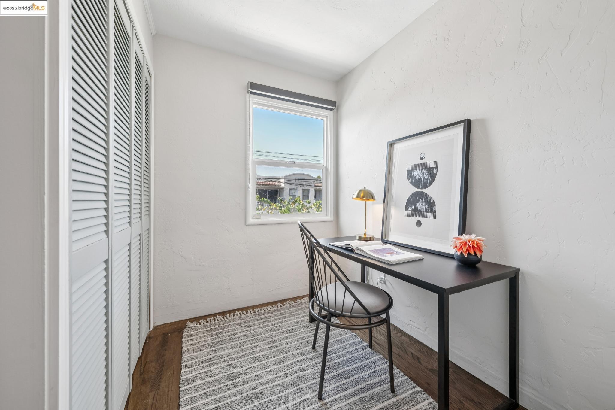 4170 Emerald Street, Unit 4 Oakland, CA 94609 - Photo 23 of 37 Office space featuring a textured wall and wood finished floors