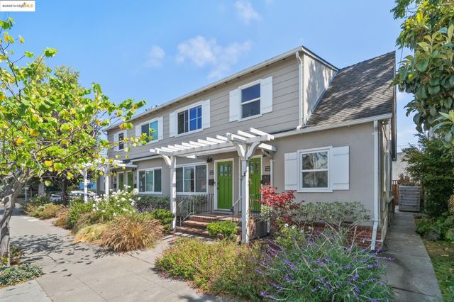 a front view of a house with a garage