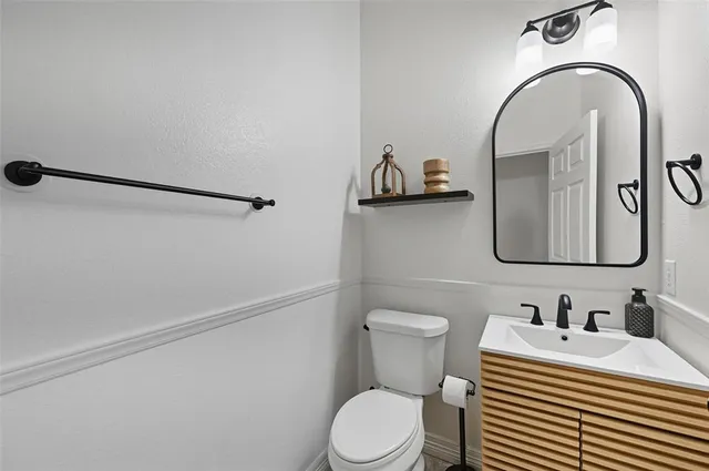 a bathroom with a sink and a toilet