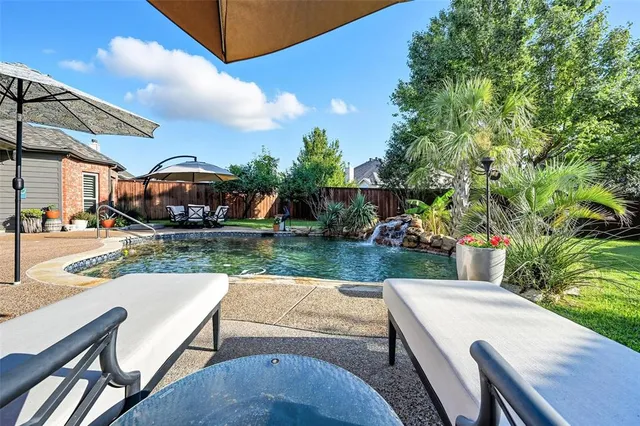 a bathroom with a sink and a shower