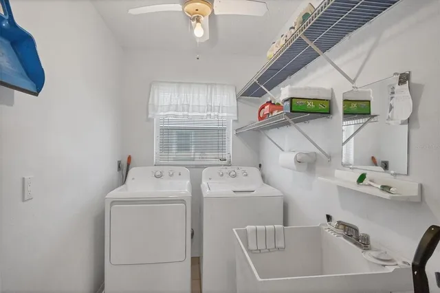 a utility room with dryer and washer