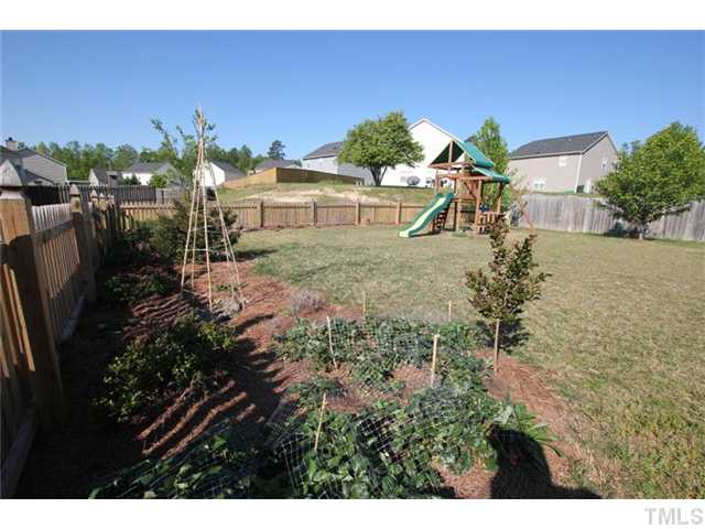 3812 Hopper Street Raleigh, NC 27616 - Photo 18 of 19 a view of a backyard