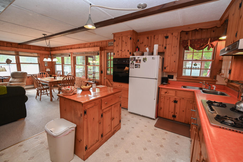 18 Loon Lane Dedham, ME 04429 - Photo 13 of 31 Kitchen & Living Room