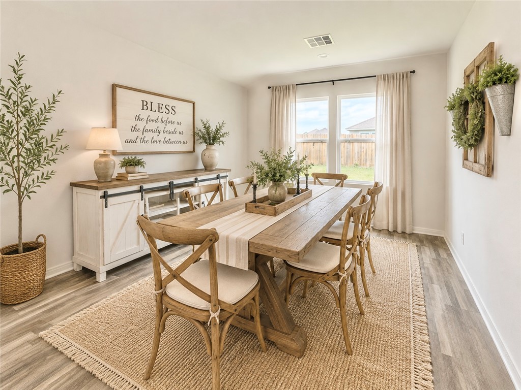 137 Windmill Road Somerville, TX 77879 - Photo 4 of 17 a dining room with furniture and window