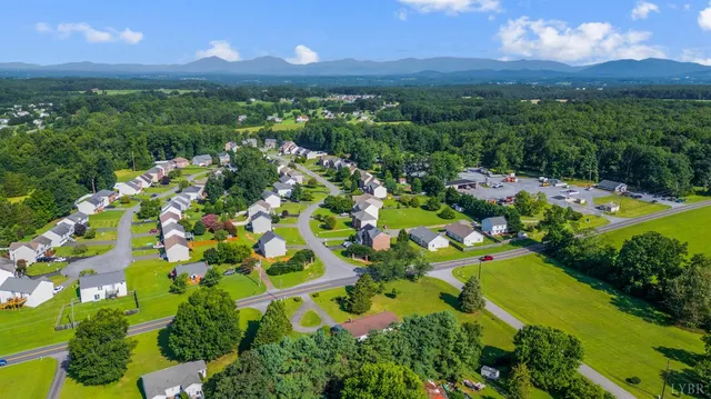 a view of a room with a door and a porch