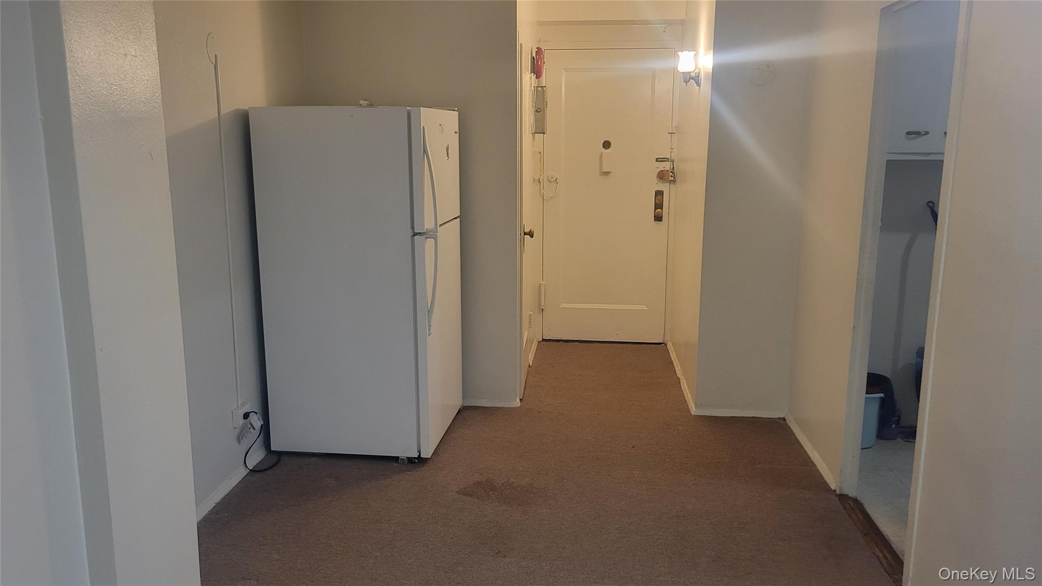 1596 Unionport Road, Unit 2E Bronx, NY 10462 - Photo 2 of 7 a view of a room with a refrigerator