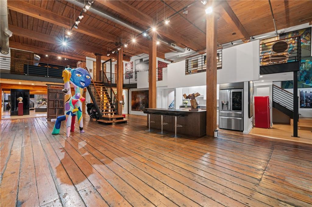 161 Mangum Street Southwest, Unit 102 Atlanta, GA 30313 - Photo 1 of 48 a view of a room with wooden floor