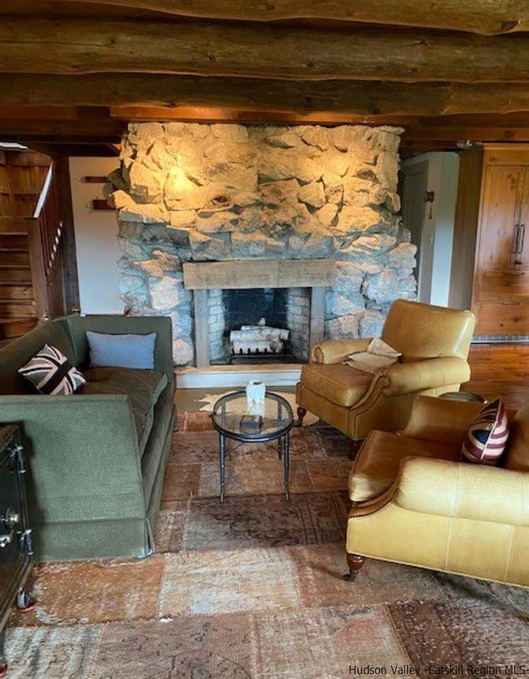 41 Stokes Way High Falls, NY 12440 - Photo 7 of 35 a living room with furniture and a fireplace