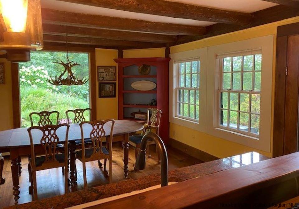 41 Stokes Way High Falls, NY 12440 - Photo 10 of 35 a view of a dining room with furniture window and wooden floor
