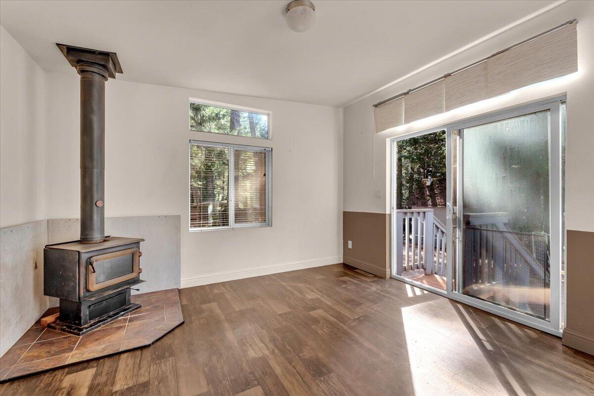 8495 Sky Tree Lane Shingletown, CA 96088 - Photo 13 of 55 a view of livingroom with furniture and windows