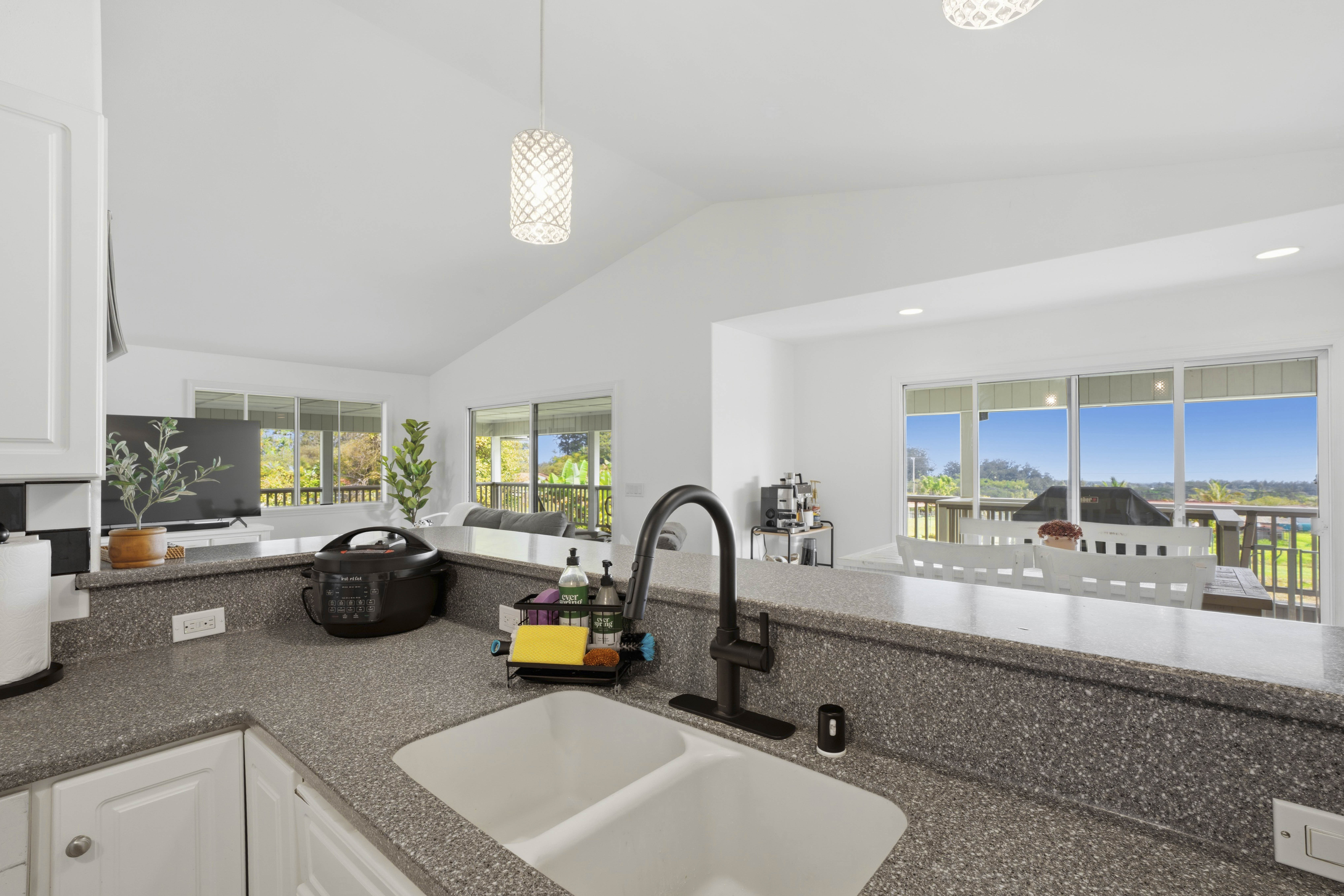 18-3970 Canney Road Mountain View, HI 96771 - Photo 12 of 30 a kitchen with counter top space windows and appliances