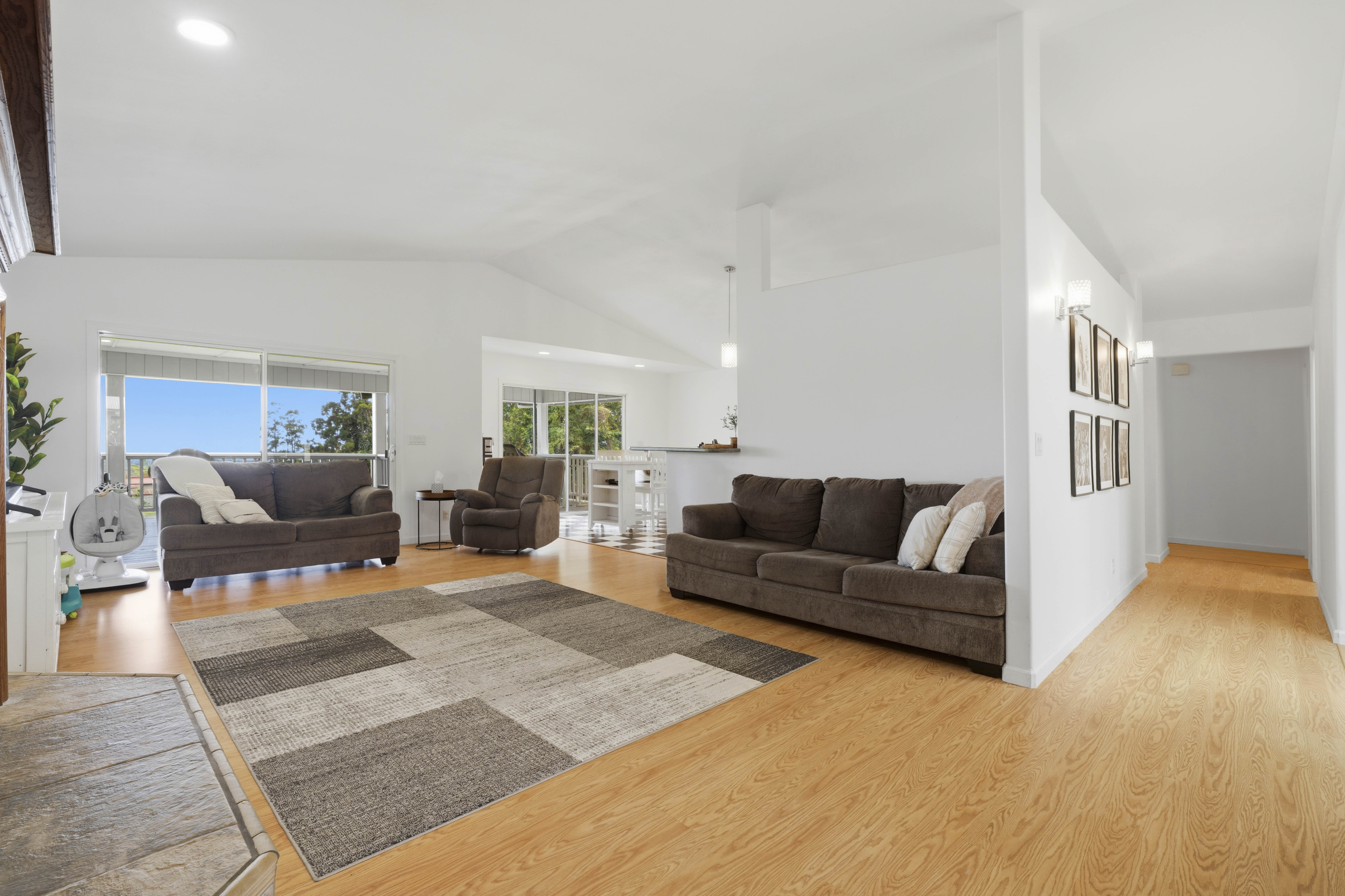 18-3970 Canney Road Mountain View, HI 96771 - Photo 3 of 30 a living room with furniture and a wooden floor