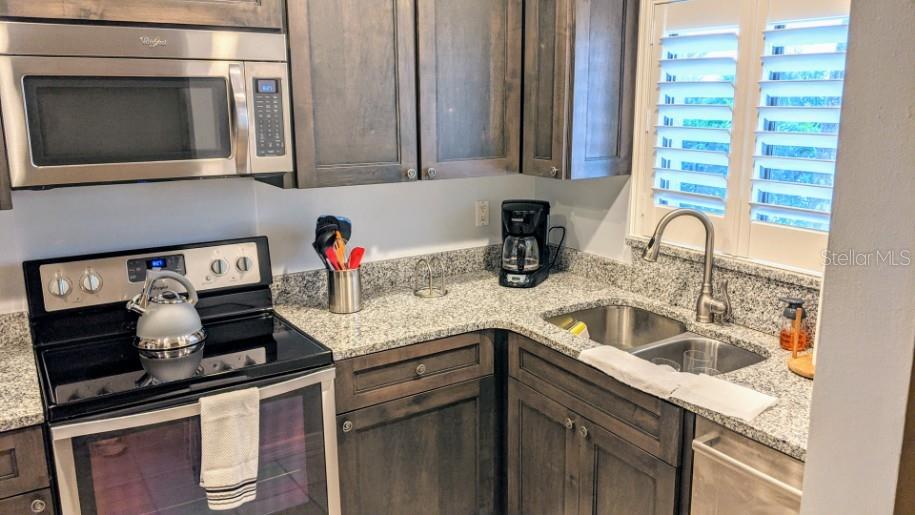 1624 Stickney Point Road, Unit 107 Sarasota, FL 34231 - Photo 2 of 12