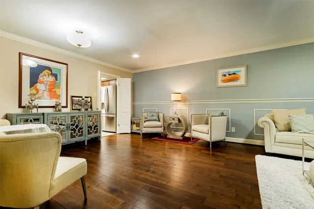 a kitchen with stainless steel appliances granite countertop a stove and a microwave
