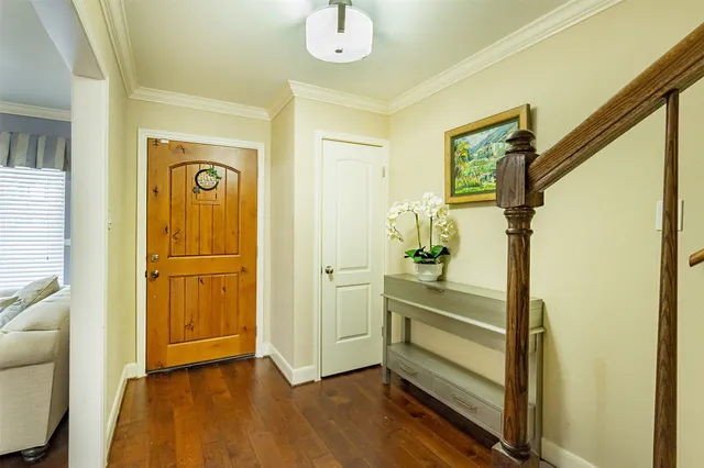 a view of entryway with wooden floor