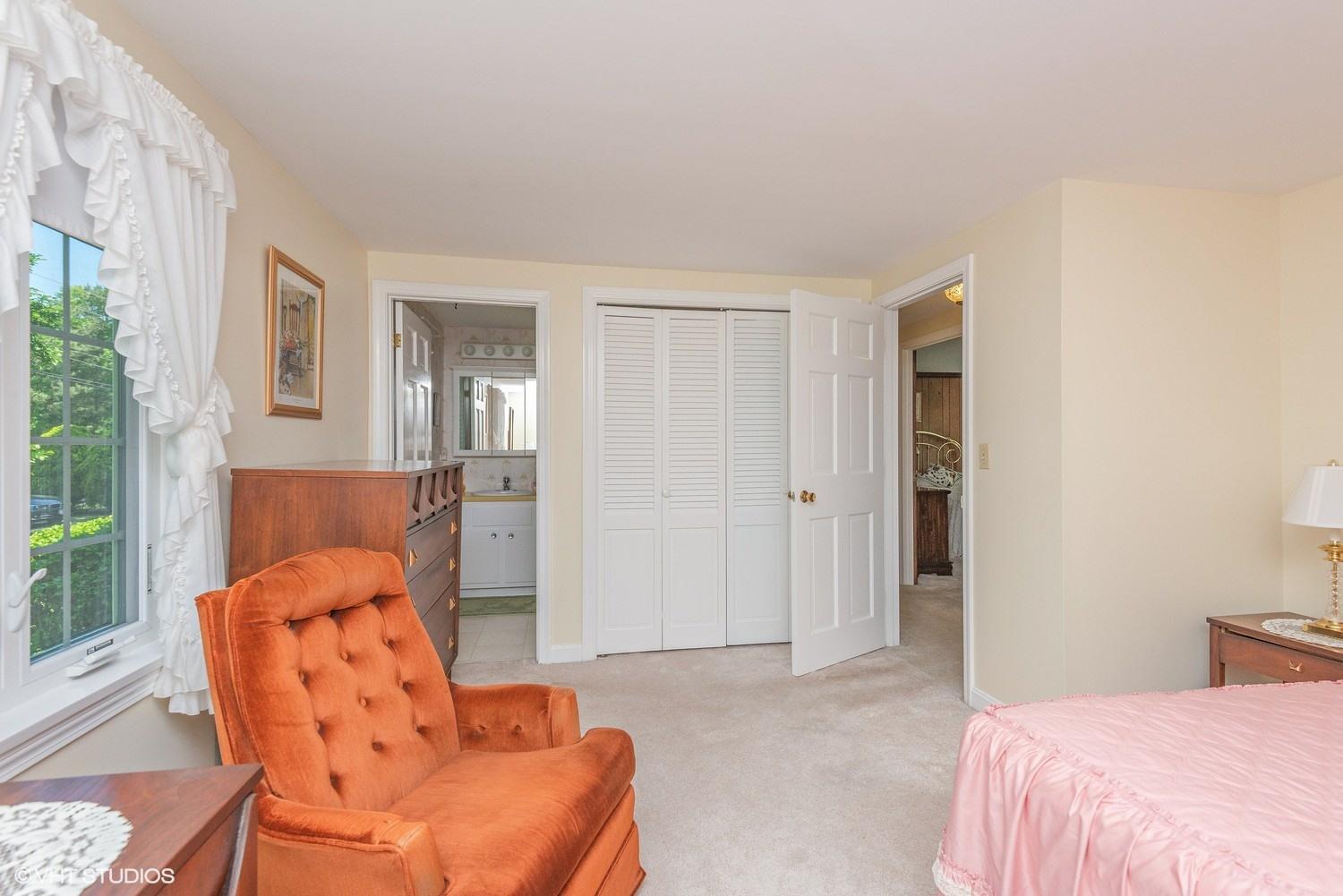 366 Nottingham Drive Centerville, MA 02632 - Photo 12 of 15 a bedroom with a bed and chair