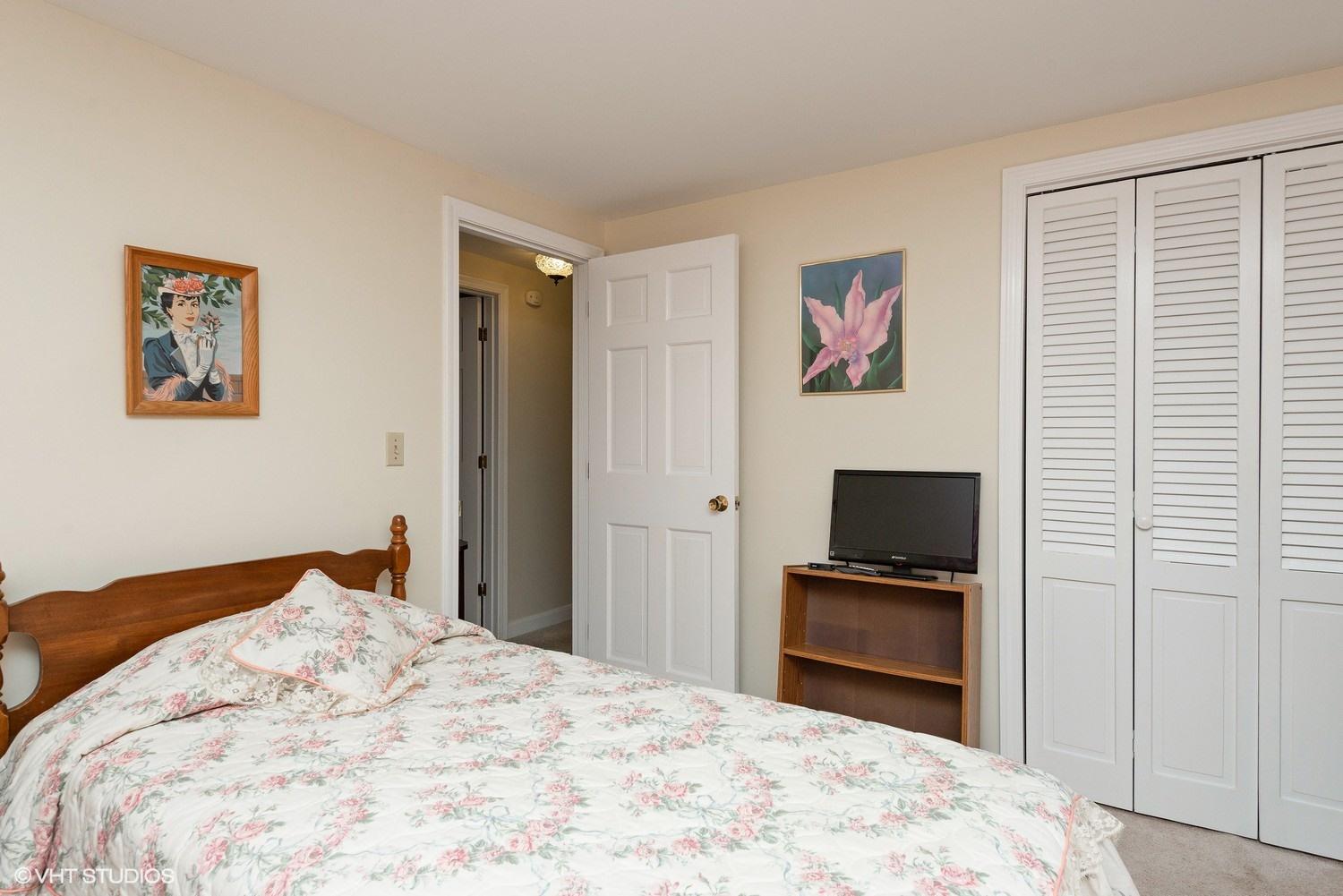 366 Nottingham Drive Centerville, MA 02632 - Photo 15 of 15 a bedroom with a bed and a flat screen tv