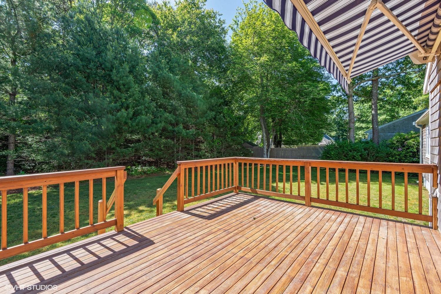 366 Nottingham Drive Centerville, MA 02632 - Photo 4 of 15 a view of balcony with wooden floor and fence