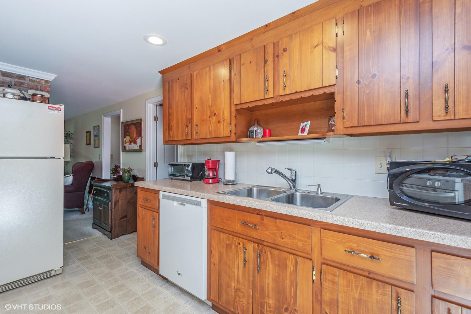 366 Nottingham Drive Centerville, MA 02632 - Photo 7 of 15 a kitchen with stainless steel appliances granite countertop a refrigerator sink and stove