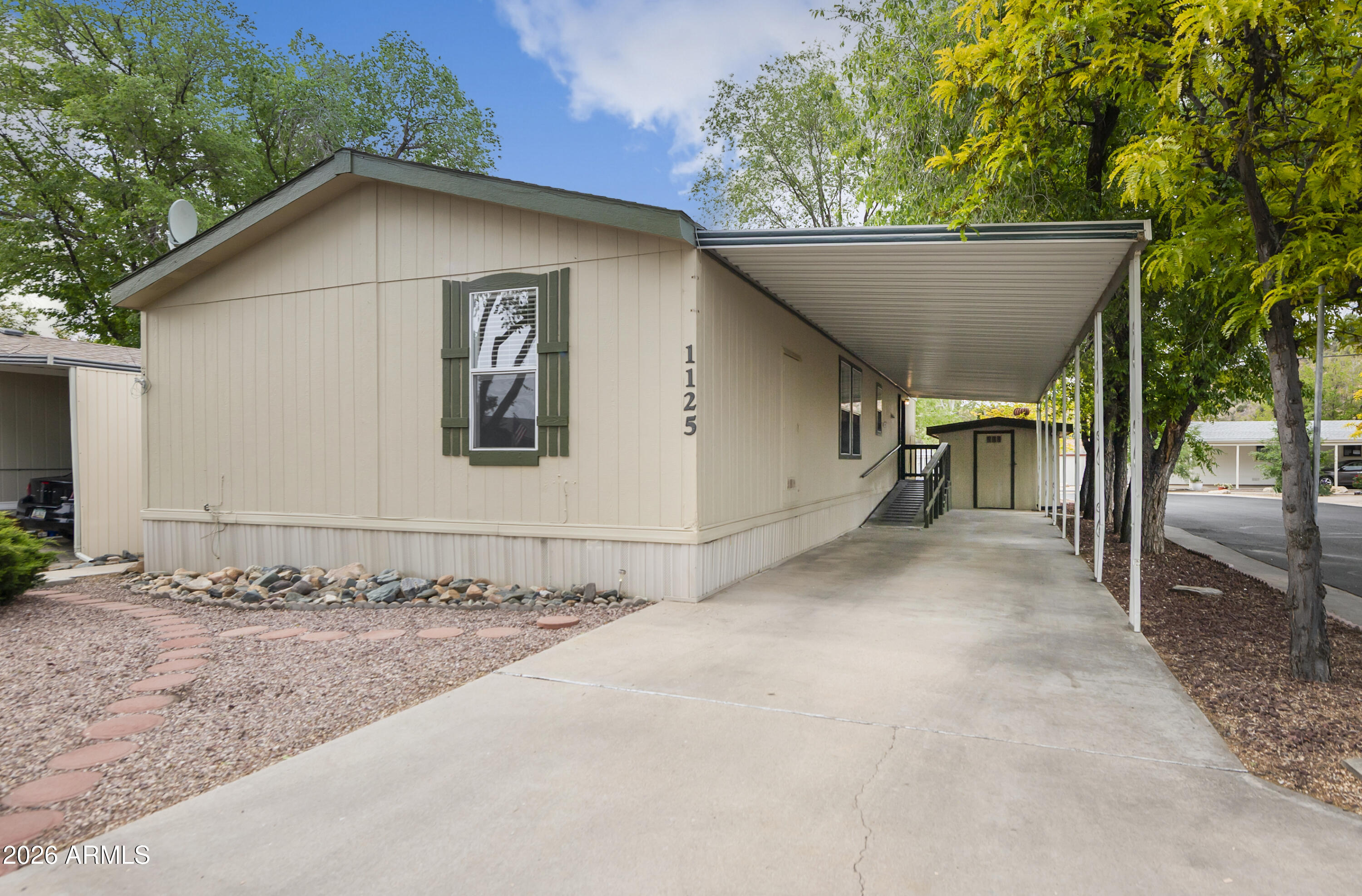 11250 East State Rte 69, Unit 1125 Dewey, AZ 86327 - Photo 37 of 45 a view of a house with a outdoor space