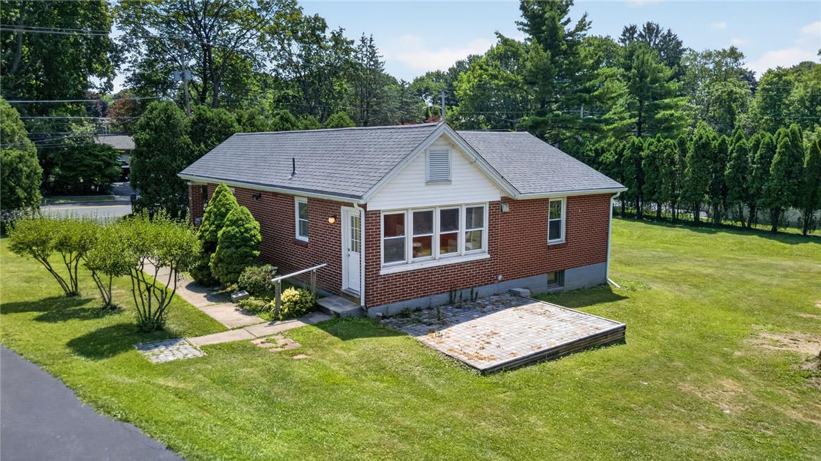 1166 Stones Crossing Road Easton, PA 18045 - Photo 22 of 35 A charming brick residence awaits with a spacious yard and inviting outdoor patio.