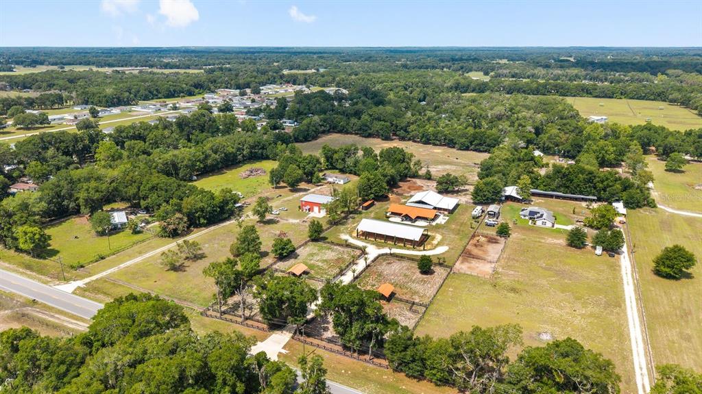 16392 Northeast Jacksonville Road Citra, FL 32113 - Photo 40 of 44 an aerial view of residential house with outdoor space