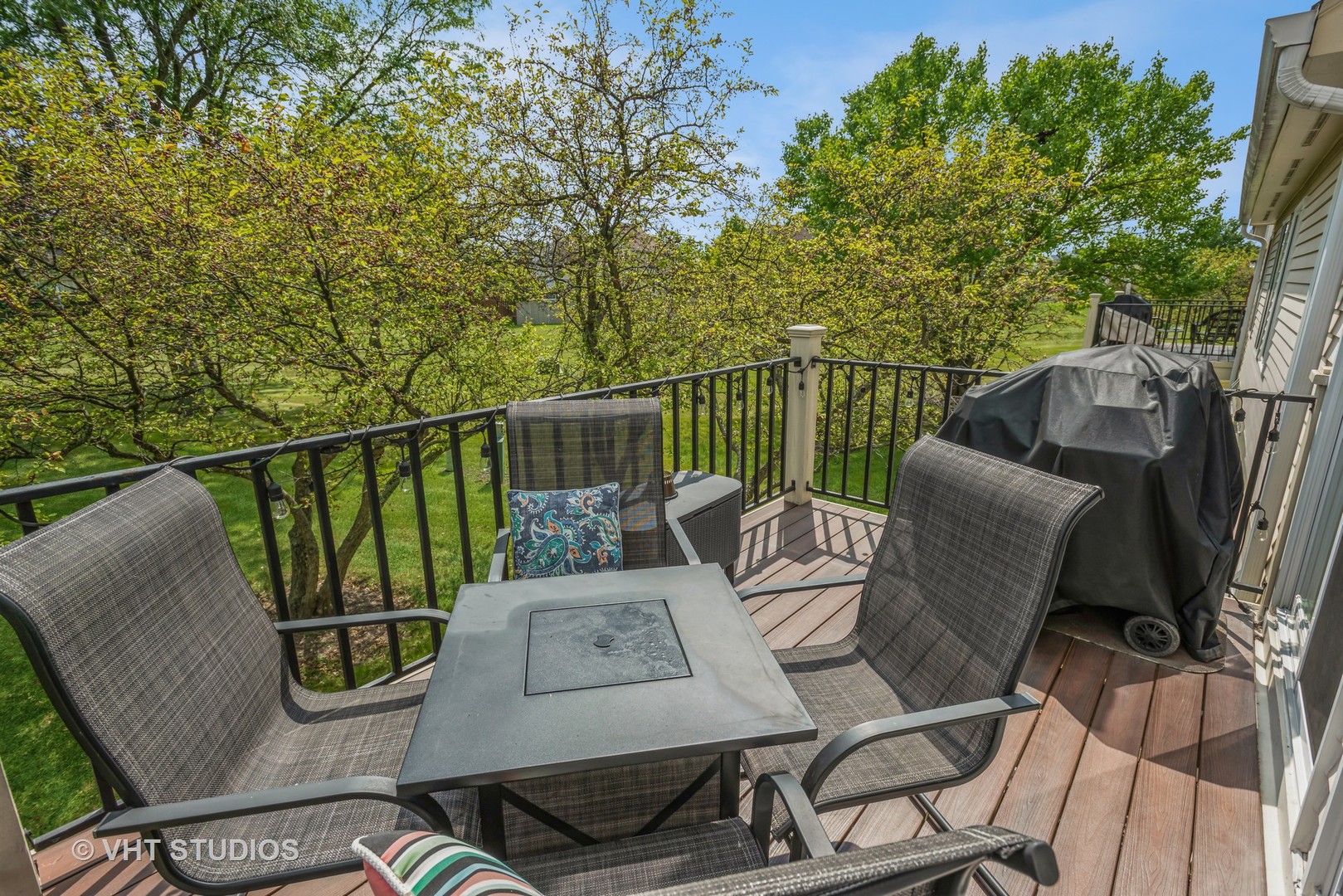 370 Ashford Circle, Unit 2 Bartlett, IL 60103 - Photo 13 of 13 a view of a chairs and table on the deck