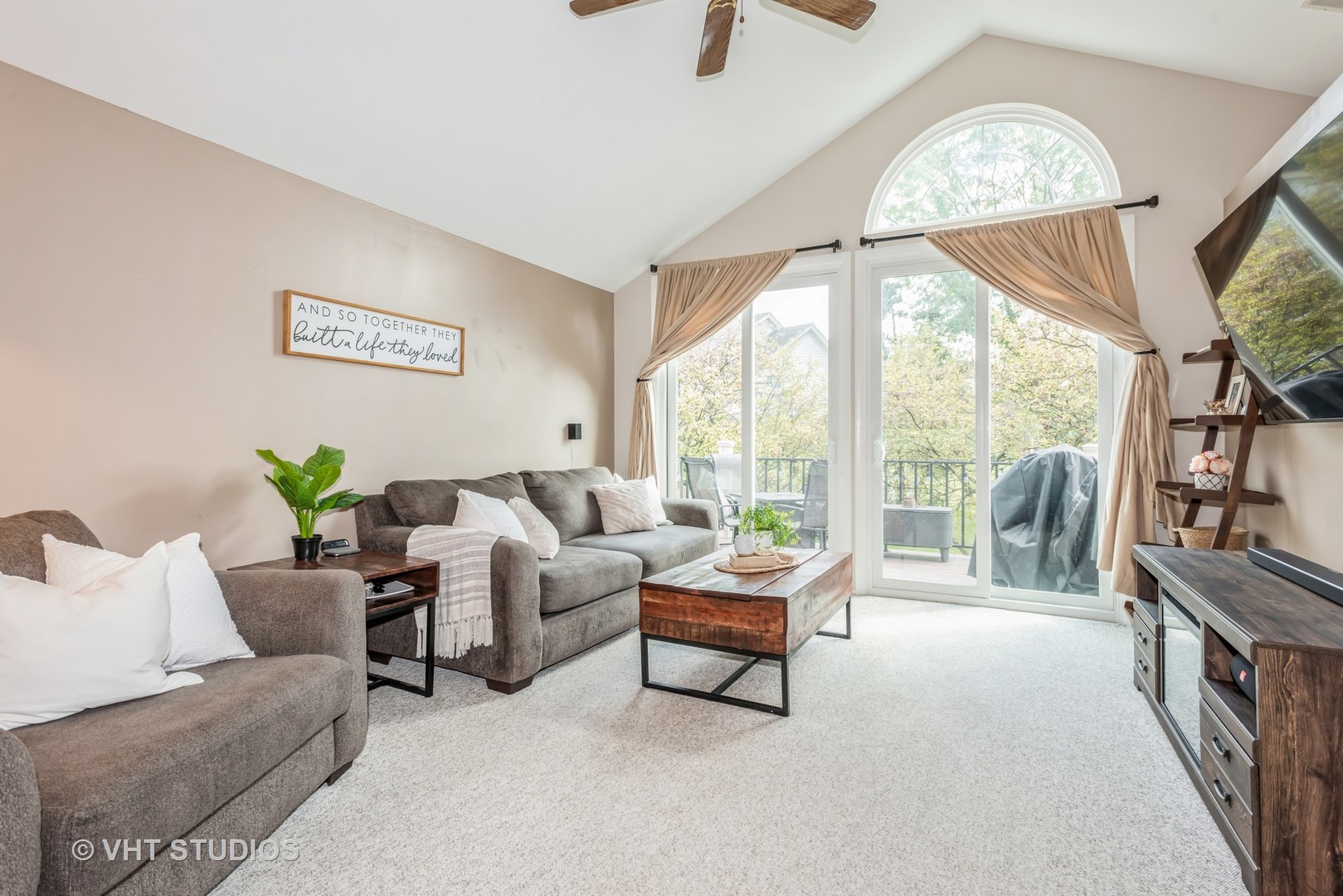 370 Ashford Circle, Unit 2 Bartlett, IL 60103 - Photo 3 of 13 a living room with furniture and a large window