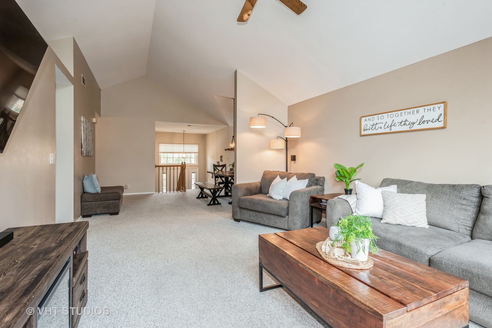 370 Ashford Circle, Unit 2 Bartlett, IL 60103 - Photo 4 of 13 a living room with furniture and a couch