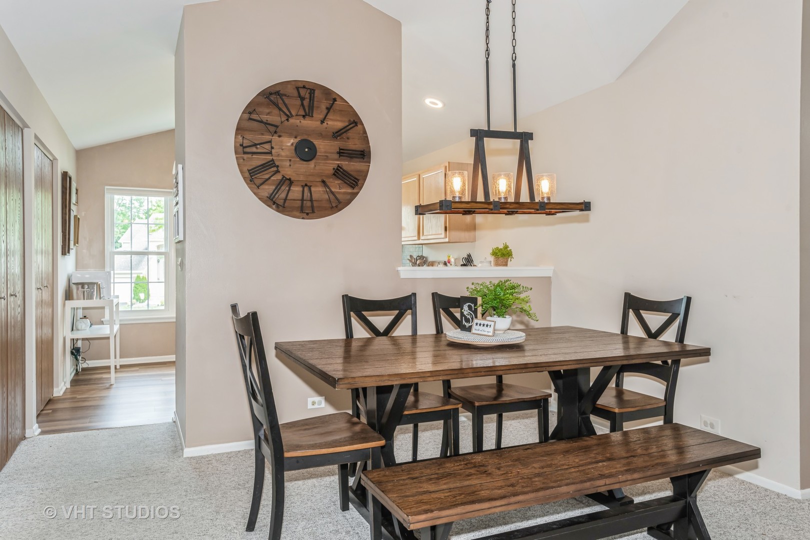 370 Ashford Circle, Unit 2 Bartlett, IL 60103 - Photo 5 of 13 a view of a dining room with furniture and wooden floor