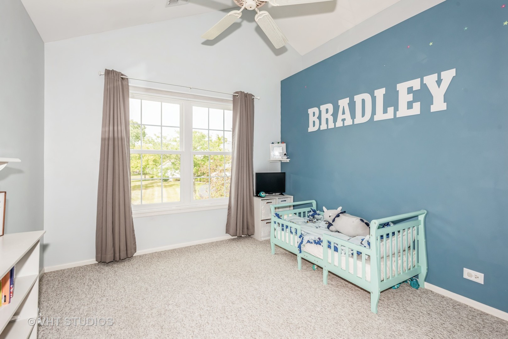 370 Ashford Circle, Unit 2 Bartlett, IL 60103 - Photo 10 of 13 a bedroom with furniture and window