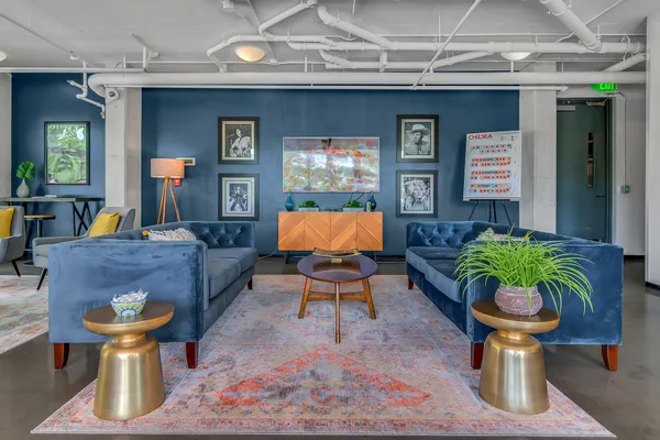 a living room filled with furniture and window