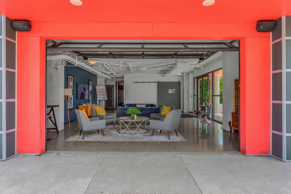 a view of a chairs and table in the patio