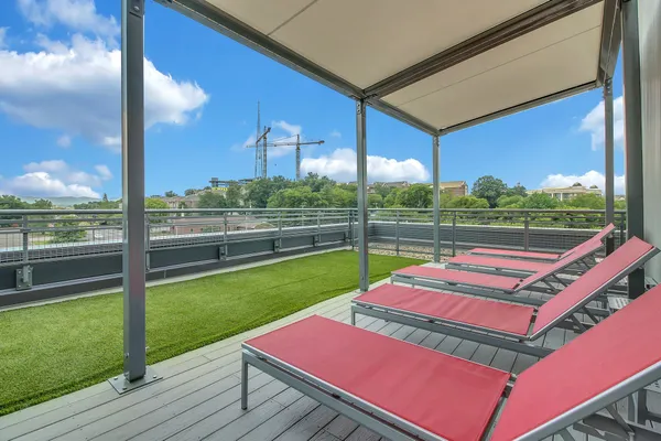 a view of a yard with a patio