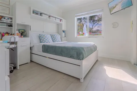 a room with a bed and a couch