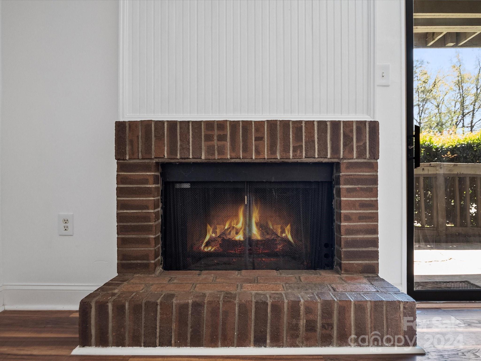 4906 Sardis Road, Unit F Charlotte, NC 28270 - Photo 13 of 30 a fireplace with a balcony