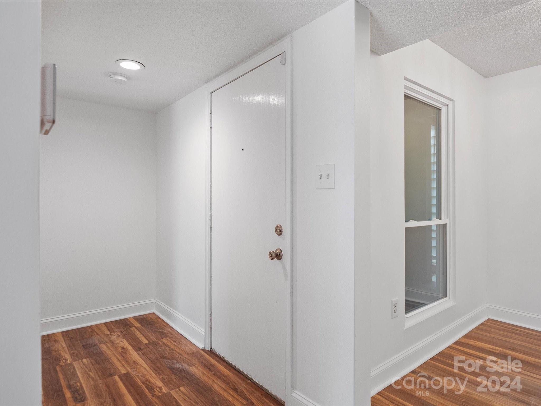 4906 Sardis Road, Unit F Charlotte, NC 28270 - Photo 9 of 30 a view of hallway with closet