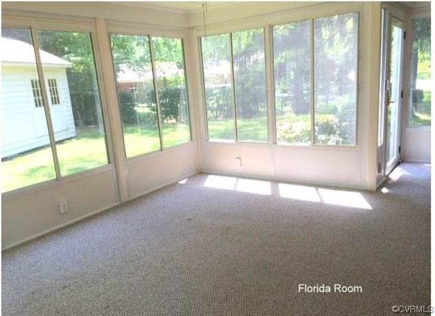 11301 Rochelle Road Chester, VA 23831 - Photo 13 of 17 a view of empty room with front door